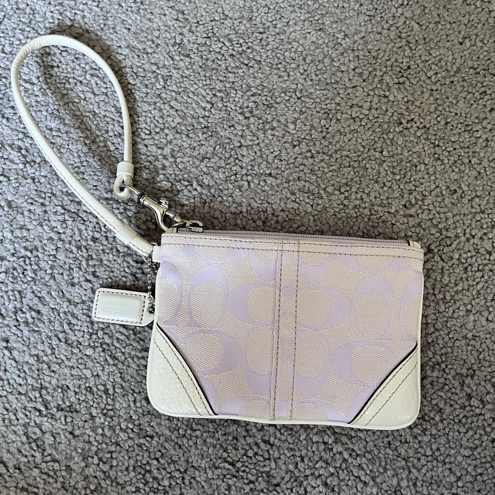 Purple and white coach wristlet